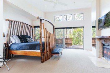 Sleep in a wine barrel bed